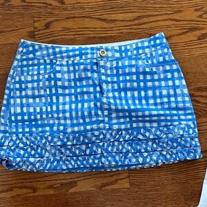 Lilly Pulitzer mini skirt
Blue and whitete check with ruffle bottom
Size 6
